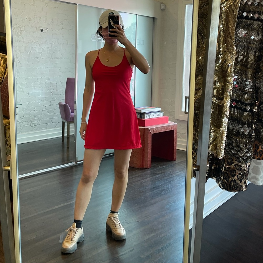 Red sports tennis dress with shorts and padded bra